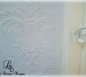 Dress Up Boring Cabinet Doors With Embossed Wall Paper And New