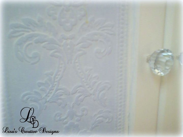Dress Up Boring Cabinet Doors With Embossed Wall Paper And New