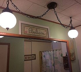 repurposing ideas for medicine cabinet and light fixture, I would love to do something unique with this light fixture so that I don t have to replace it