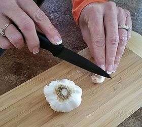 don t toss leftover coffee grounds look what she does, cleaning tips, repurposing upcycling, Fresh Garlic Makes for Garlic Smelling Hands