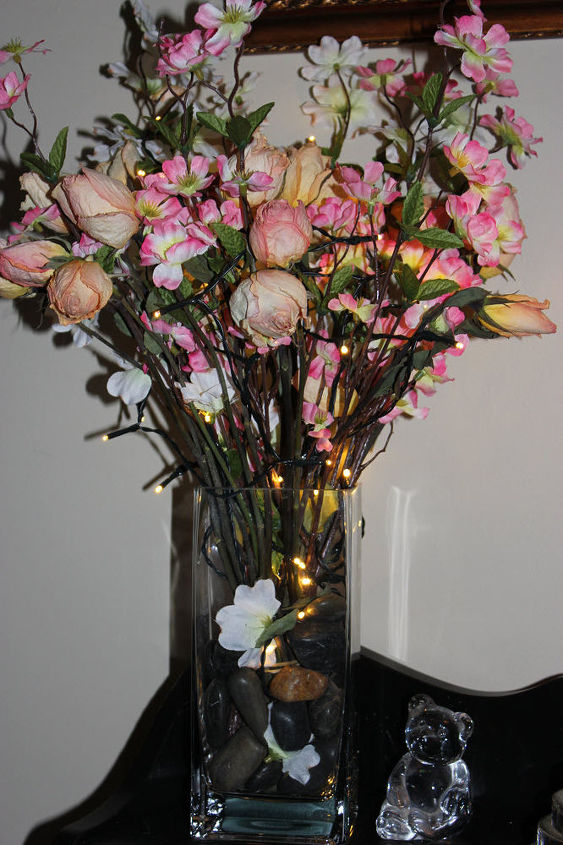 crie uma elegante pea central floral iluminada