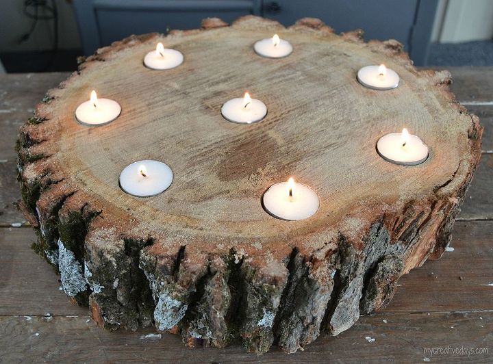 centro de mesa con velas de madera