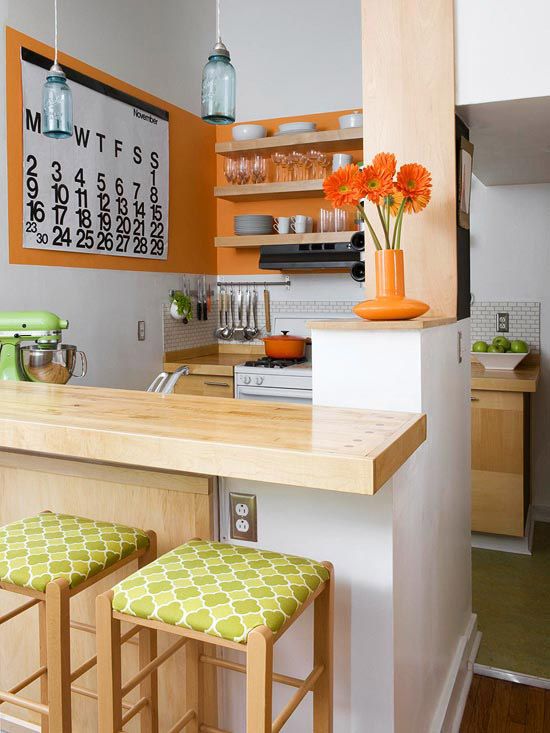 q how to organize a kitchen with custom shelving and storage, kitchen design, organizing, shelving ideas, storage ideas, Love this idea Highlight Open Shelves accented with a color block backdrop Create the look by masking off a large rectangle with painter s tape and rolling on your accent color Remove the tape and hang your shelves