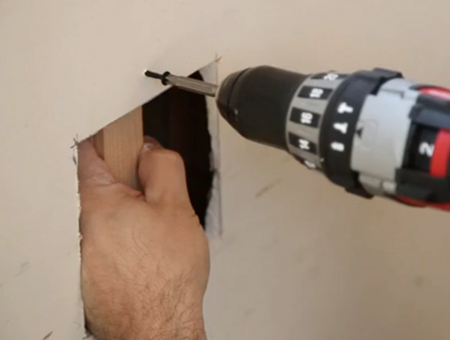 como reparar um buraco no drywall