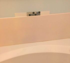 diy bathtub makeover, 1st piece of adhesive tile