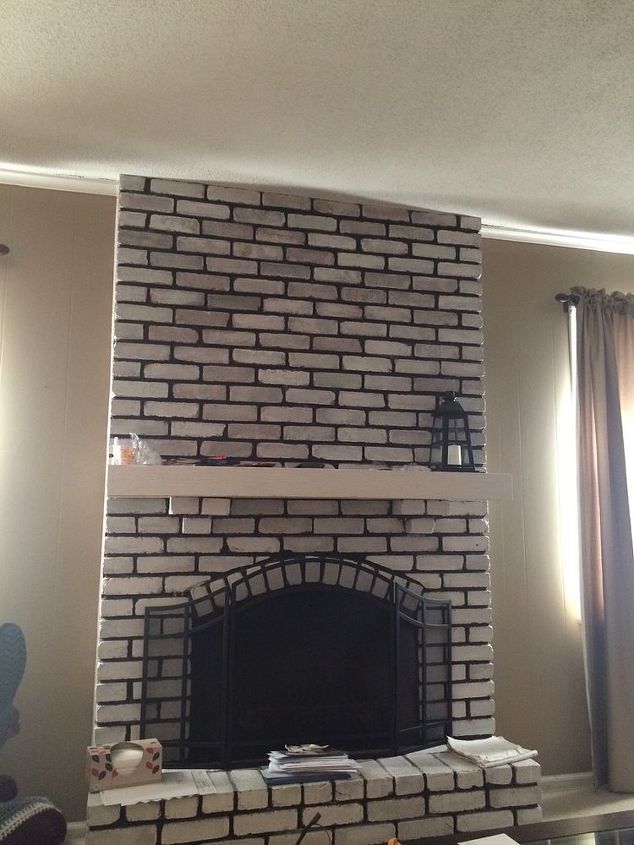White Washed Brick Fireplace Mantle, White Brick Fireplace With Black Mantel