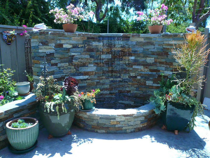 q important components for backyard landscape design, landscape, outdoor living, ponds water features, this photo shows a water shower in your residential landscape design and this can also be wondrious