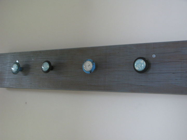 old door used as hall art, doors, repurposing upcycling, Coat rack using vintage cabinet knobs