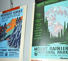 vintage travel posters hung with antique hangers, repurposing upcycling, wall decor