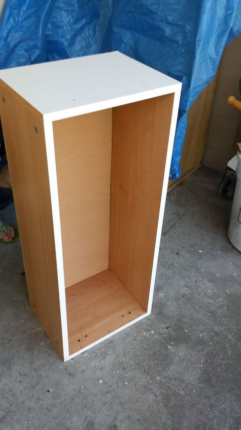 repurposed laminate cabinet turned big puppy center, kitchen cabinets, painted furniture, pets animals, repurposing upcycling, storage ideas, cabinet before