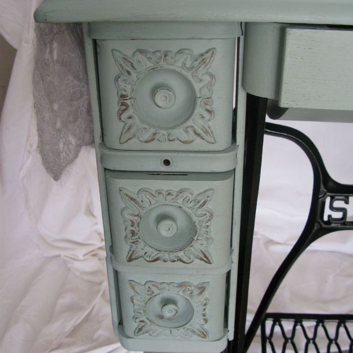 singer treadle sewing machine cabinet gets a makeover in duck egg blue, Some light distressing to hilite the detail