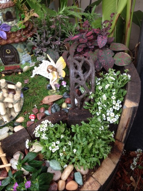 my whiskey barrel fairy garden, container gardening, crafts, gardening, repurposing upcycling
