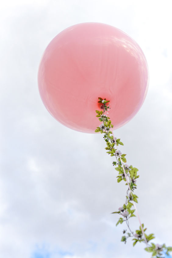 big balloon and a floral garland for spring, crafts, gardening