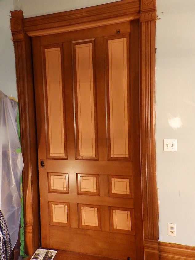 victorian dinning room painting faux wood grain doors trim, The Pocket door has 3 of the 9 panels showing