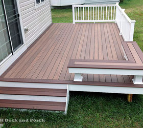 low maintenance decks, decks, outdoor furniture, outdoor living, Vinyl patio deck using Wolf PVC Decking with amberwood flooring and rosewood border and Longevity white PVC railing