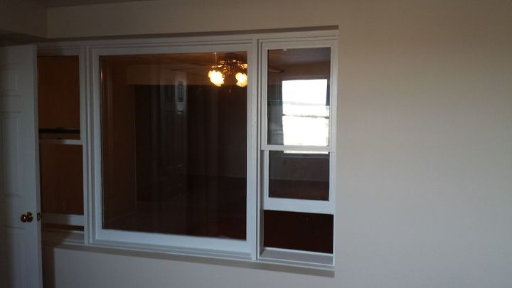 window in between rooms, This is the view from in the bedroom looking into the basement family room