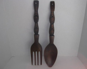 hanging a large wooden spoon and fork horizontally, See the bumpy handles these are not flat and not sure how to get them on the wall They are NOT terribly heavy