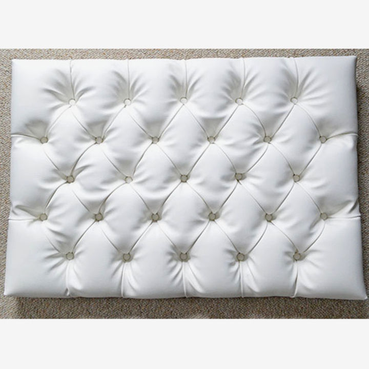 the hardest button to button a diy tufted storage ottoman, painted furniture, storage ideas, reupholster, Glue buttons on top of the screws