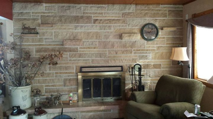 updating a stone fireplace wall, picture of entire wall there are also 3 stove shelve which I have no problem removing