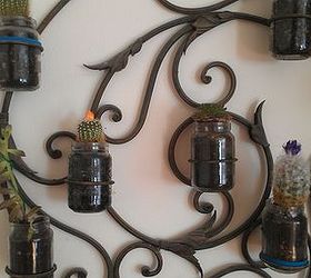 recycled wrought iron candle holder turned into planter