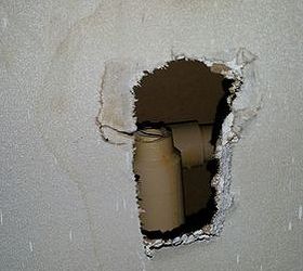 how do i fix the water pipes in my bathroom, broken part inside wall