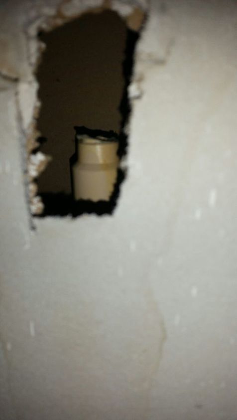 q how do i fix the water pipes in my bathroom the part with the valves on it broke off, bathroom ideas, home maintenance repairs, how to, plumbing, where pipe broke off of right vanity inside wall