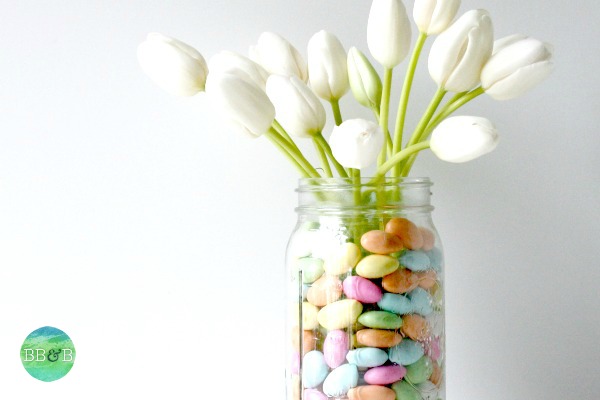 spring arrangement hack using a water bottle, crafts, flowers, repurposing upcycling, seasonal holiday decor