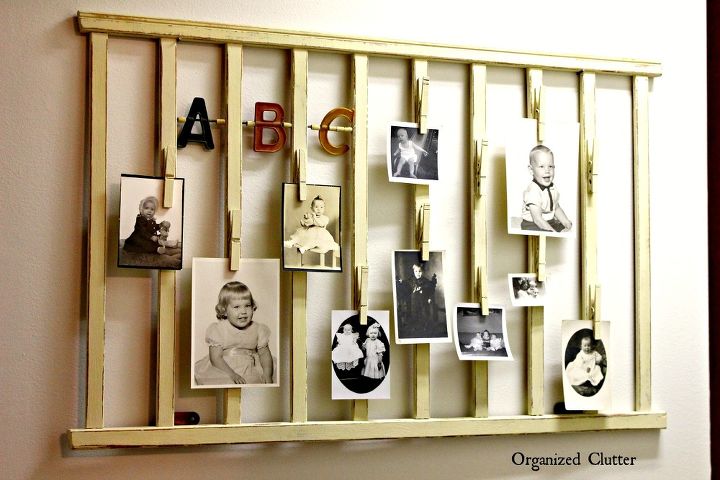 family baby photos displayed on a vintage crib rail, repurposing upcycling, wall decor