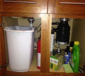 q please help me organize the chaos under my kitchen sink, kitchen design, organizing, As you can see the space under my kitchen sink is in disarray I need some organizing help
