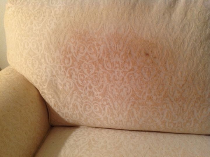 clean orange moisture spots from upholstery, sofa Fabric appears to be poly or nylon blend