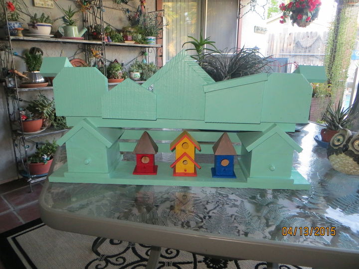 my birdhouse find is done called birdhouse condo of many colors, crafts, gardening, outdoor living, pets animals, repurposing upcycling