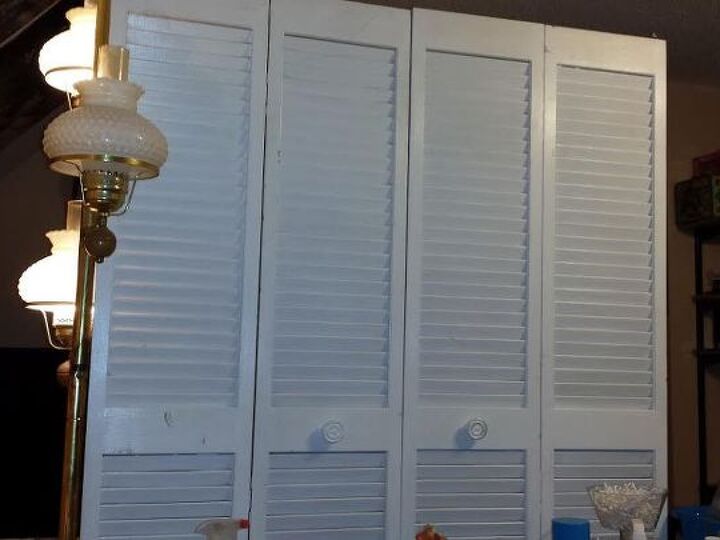 q divder challenge, doors, organizing, repurposing upcycling, only half is shown because I have a dresser and this divides to our little living room area since we recently moved back in with my mother from a 4 bedroom house so imagine all the help besides this i need