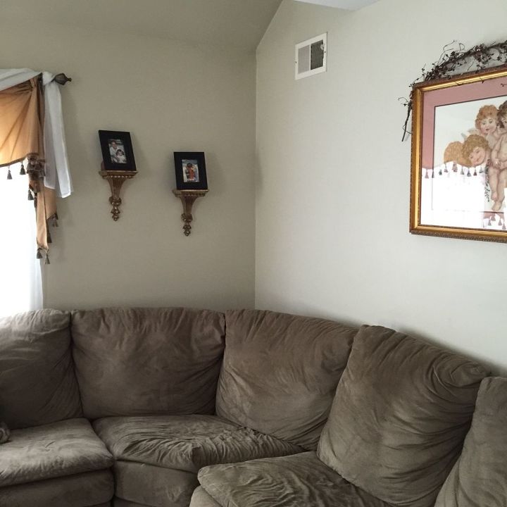 has anyone decorated that dead corner in back of sectional w mirror, This dead corner behind my sectional needs some life to it How would a tall decorative mirror look I certainly don t want to clutter and overwhelm the space HELP