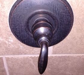 q how to get rid of hard water stains, bathroom ideas, cleaning tips, this shows hard water stains on my shower nozzle