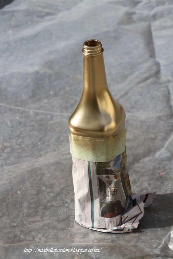 botella reutilizada pintmosla de oro