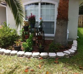 q ideas for beautiful and inexpensive backyard, gardening, outdoor living, patio, We love this he had potted all the plants Just wanting to know anyone advise on different flowers we could put here We rent our home so we don t want to put anything permanant