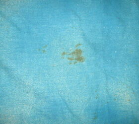how do i remove old stains from vintage hand painted fabric, dyed portion with old age spots