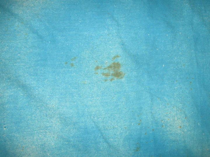 how do i remove old stains from vintage hand painted fabric, dyed portion with old age spots