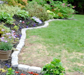 the perfect border for your beds defining a garden s edge with stone, concrete masonry, flowers, gardening, outdoor living, raised garden beds