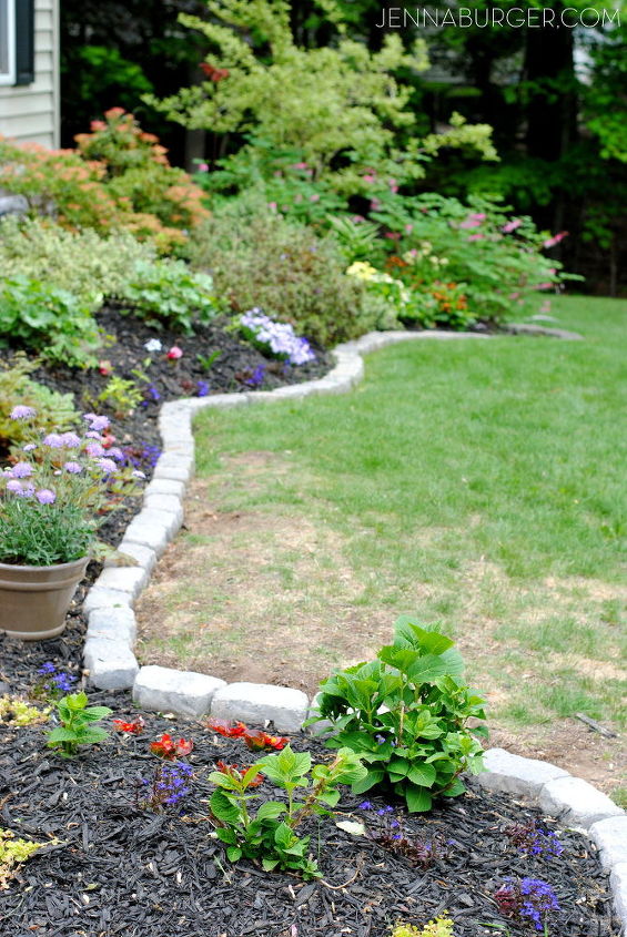 the perfect border for your beds defining a garden s edge with stone, concrete masonry, flowers, gardening, outdoor living, raised garden beds