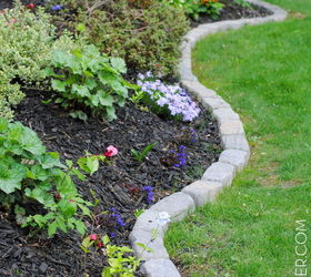 the perfect border for your beds defining a garden s edge with stone, concrete masonry, flowers, gardening, outdoor living, raised garden beds