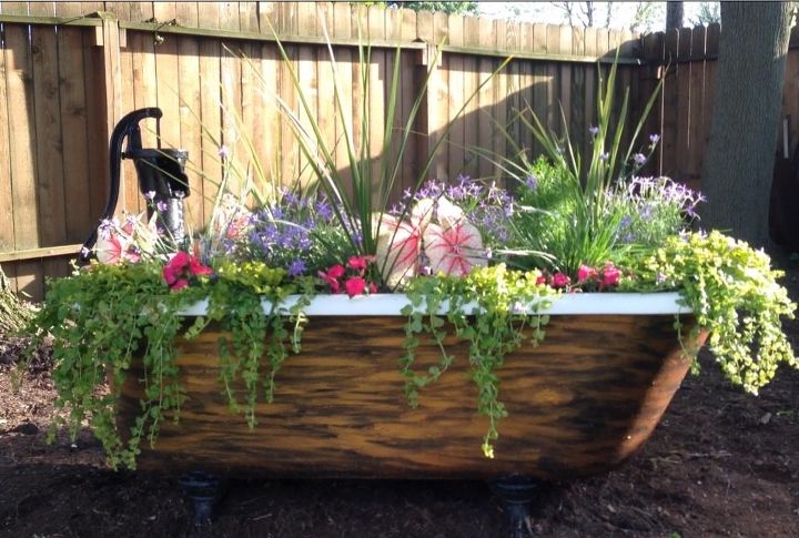 clawfoot tub with water pump garden attraction, container gardening, flowers, gardening, ponds water features, The After picture