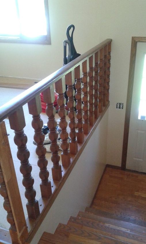 what is a good storage solution for a split level entryway, Railing with half wall