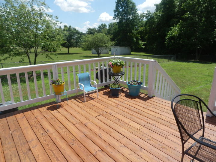 deck makeover big change for 250 00, The flowers make it look better too