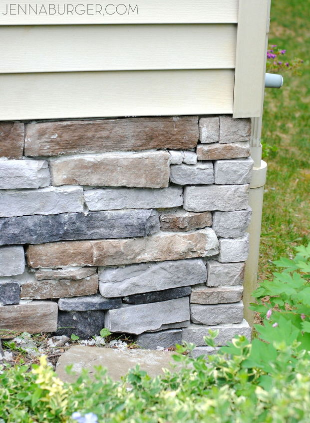 adicione folheado de pedra a uma parede de fundao de concreto