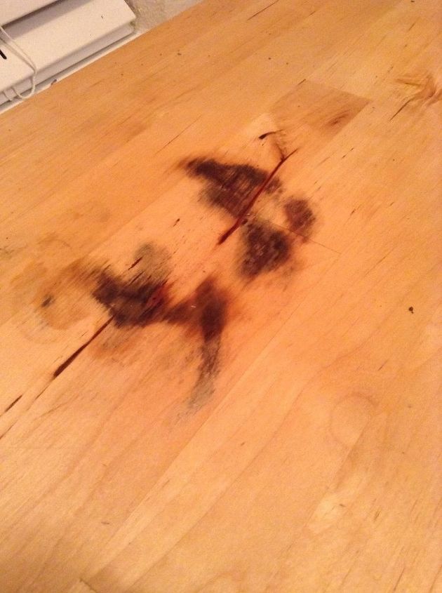 how do i remove a stain from wood counter top, This is after I wiped with white vinegar Then I also tried using a Mr Clean magic sponge It lightened a little