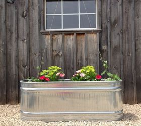 creating a raised herb garden from water troughs, container gardening, gardening, raised garden beds, repurposing upcycling