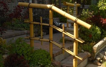  A grade e a cerca de bambu que eu projetei e meu marido construiu.