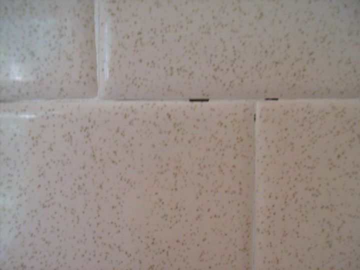 my 70s bathroom has these holes between the tiles