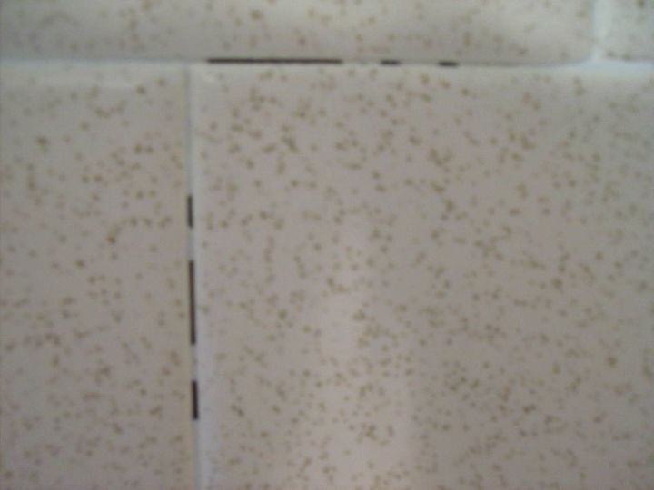 my 70s bathroom has these holes between the tiles